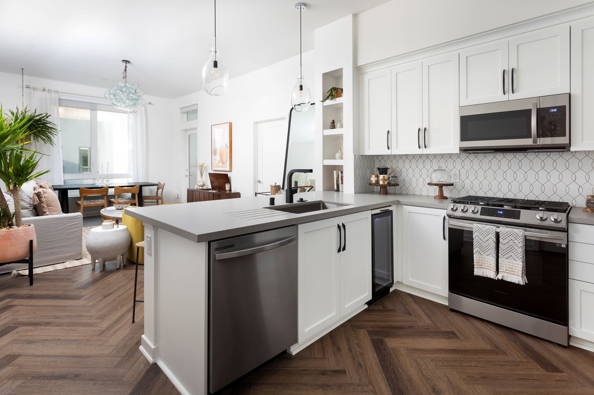 new penthouse modern white kitchen living and dining broadstone atlas apartments